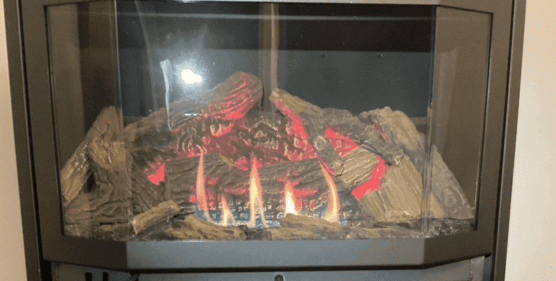 A gas log fireplace