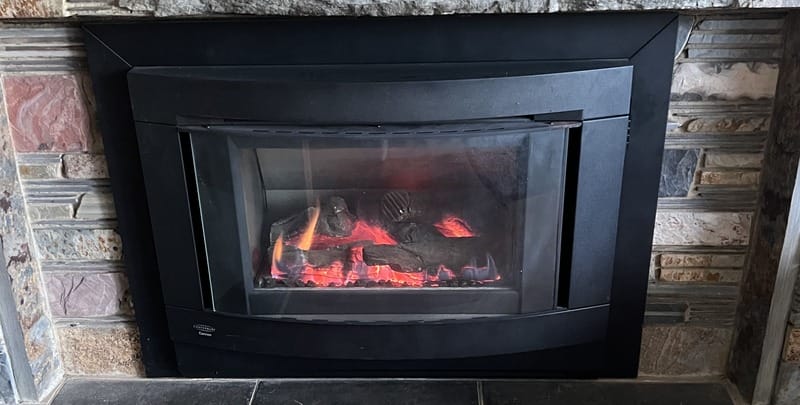 Gas log fire (flued vs unflued heaters)