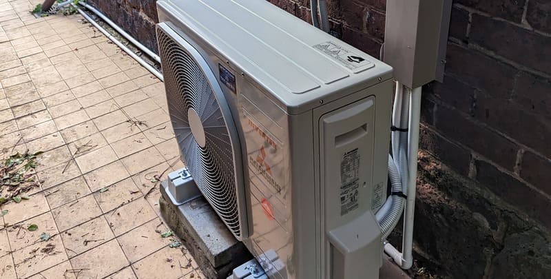 An air conditioner condenser (outdoor unit)